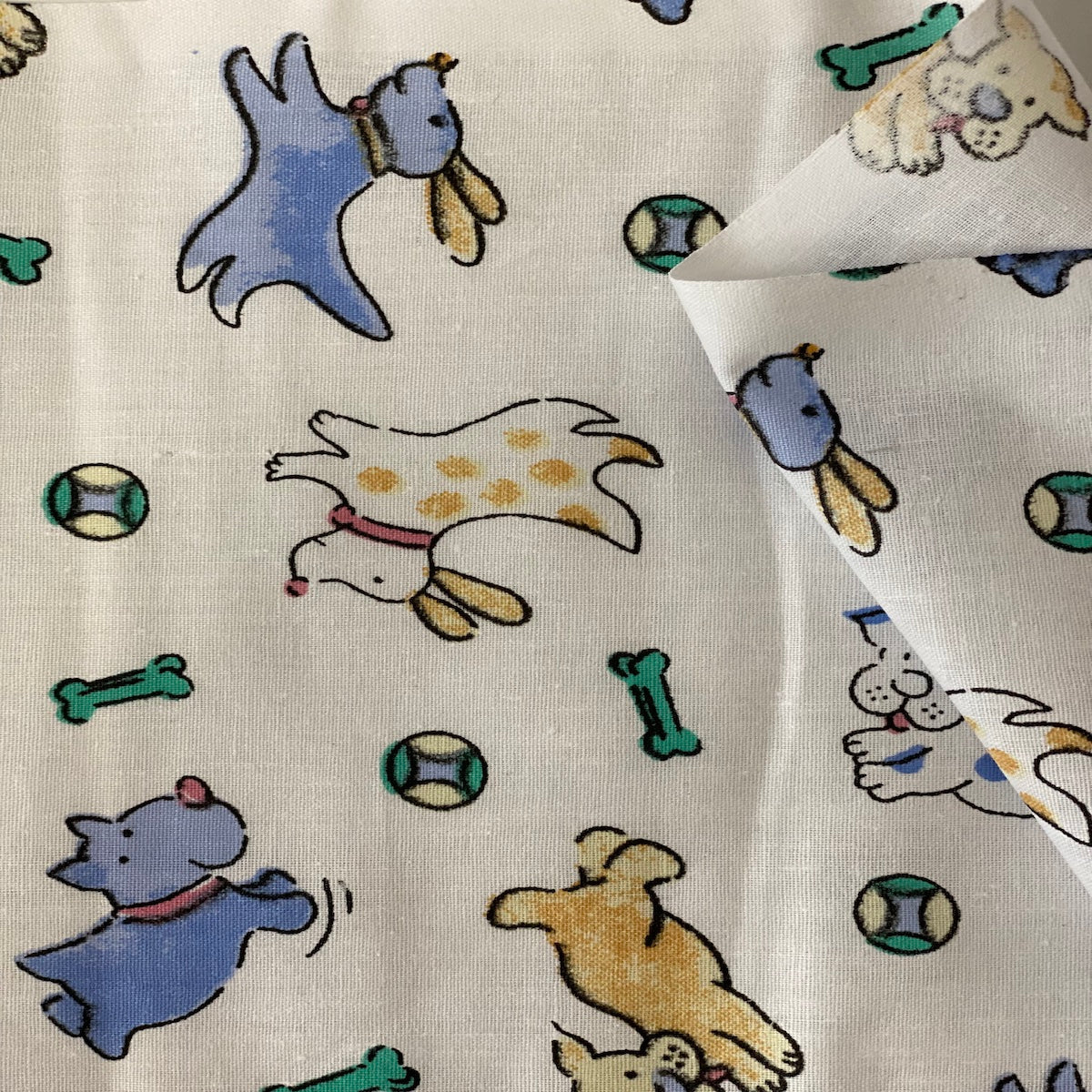 Puppy Bone Print Poly Cotton Fabric - Prismatic Fiber Arts