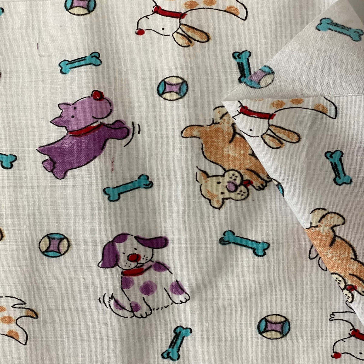 Puppy Bone Print Poly Cotton Fabric - Prismatic Fiber Arts