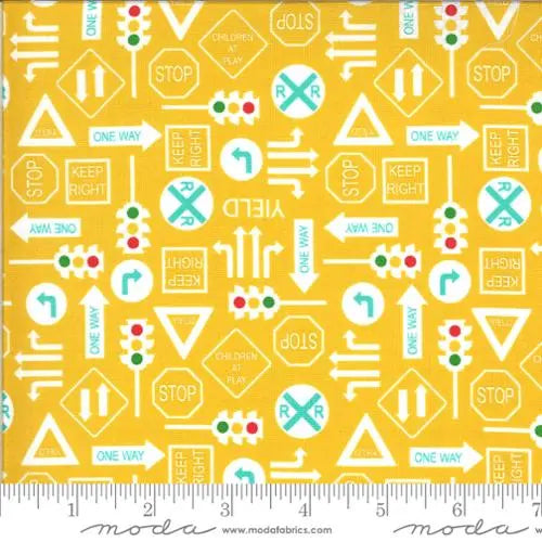 On The Go Yellow Traffic Signs Backhoe 44"/45" Fabric Per Yard - Prismatic Fiber Arts